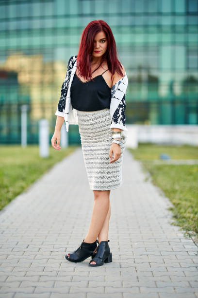 istock Redhead lady in urban environment 874342168