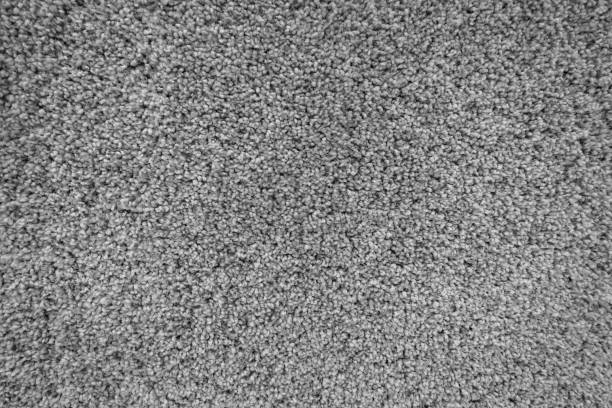 istock Gray carpet textures with long hairs fiber for background, natural textile 874347280