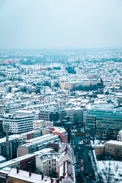 istock Aerial view of snow covered rooftops in Berlin, Germany 874347356