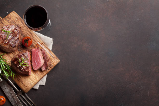 istock Grilled fillet steak with wine 874347486