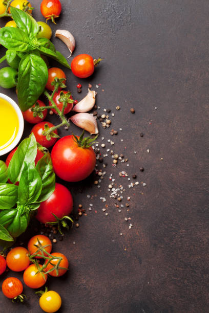 istock Tomatoes, basil, olive oil and spices 874349178
