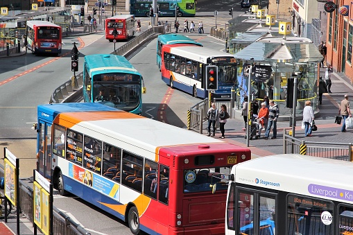 Liverpool: People ride StageCoach buses on in Liverpool, UK. Stagecoach Group has 16 percent bus market in the UK. Stagecoach UK employs 18,000 people.