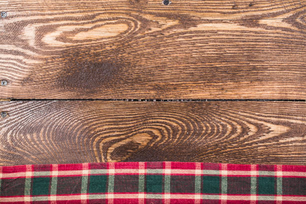 istock Rustic wooden boards with a red checkered tablecloth 874360022