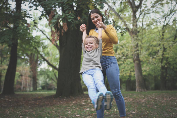 istock Mother playing with child. On the move. 874363622