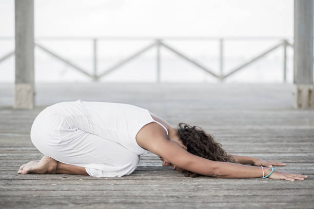 Yoga balasana child pose Young woman doing balasana Child yoga pose childs pose stock pictures, royalty-free photos & images