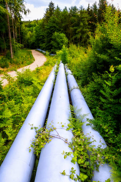 istock Industrial pipeline with gas and oil 874376324