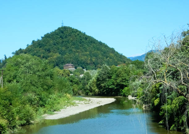 istock Beautiful view of the pyramid mountain and mountain river 874382480