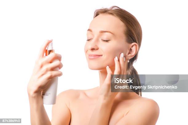 Beautiful Woman Face Spray On Face Lotion Cosmetology Stock Photo - Download Image Now