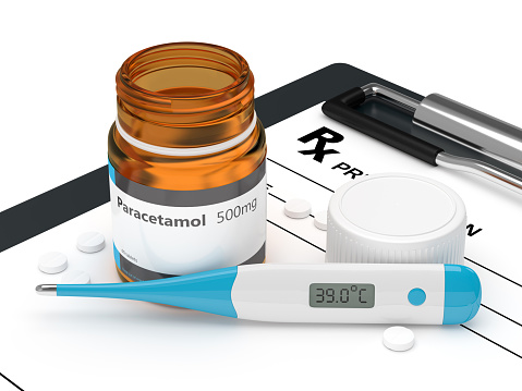 3d rendering of paracetamol pills lying with thermometer on rx and clipboard. Acetaminophen medication concept.