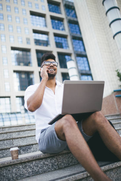 istock Business man in city 874387990