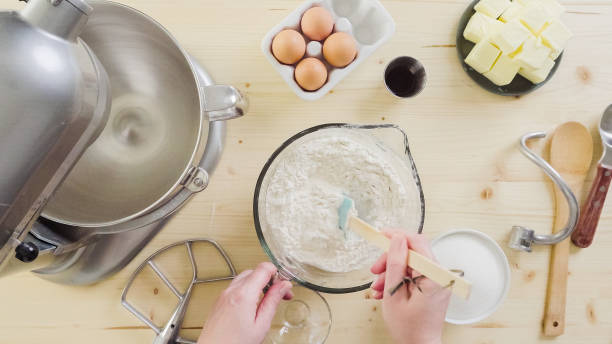 istock Preparing sugar cookie dough for holiday baking season. 874388076