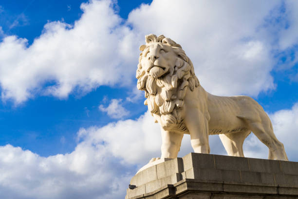 London Great Britain, October 12 2017, South Bank Lion Statue, Nice stone sculpture with beautiful blue sky