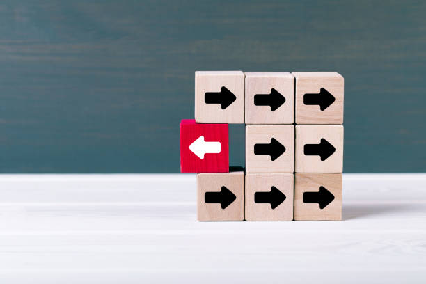 istock stand out think different. individuality and leadership concept 874390796