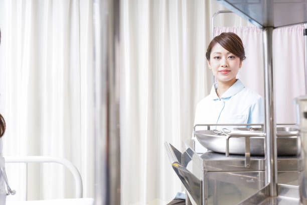 istock Nurse working at hospital 874391692