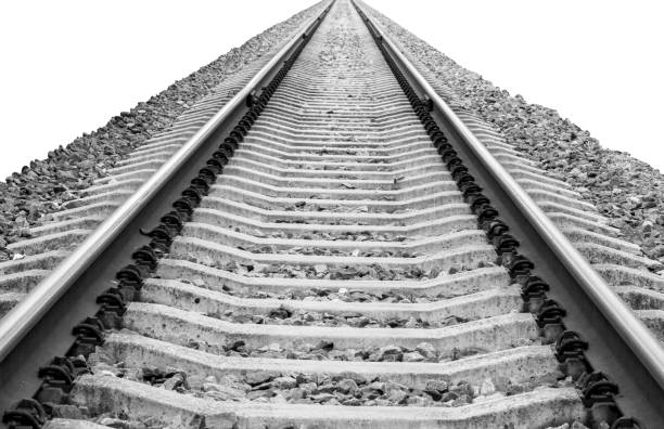 istock Railroad vanishing to horizon isolated on white background 874394814