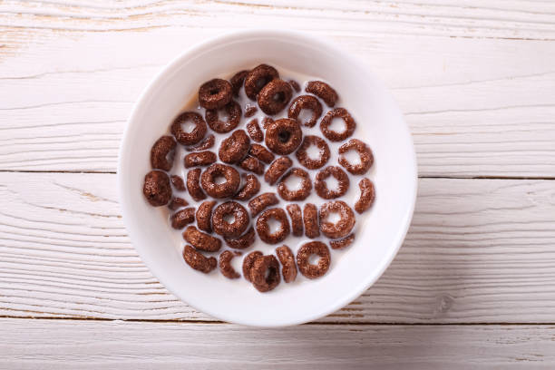 istock Cereal for Breakfast is on the table. Delicious rings from milk 874395668