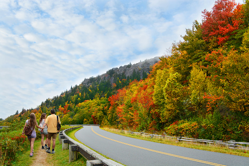Family  on autumn hiking trip enjoying   beautiful views . Blue Ridge Parkway. Close to Blowing Rock, North Carolina, USA.