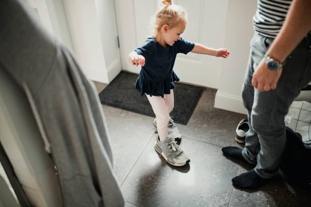 Trying Daddy's Shoes On
