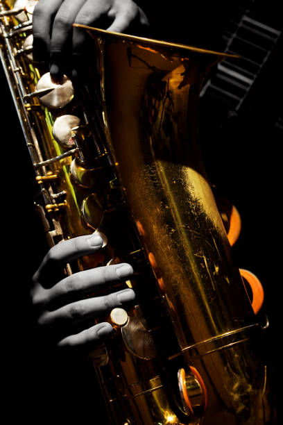 istock Saxophone Player Saxophonist Closeup Isolated On Black Background 874403144