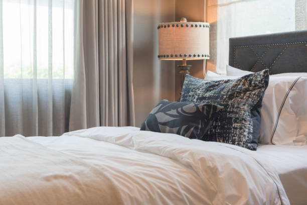 istock single bedroom with set of pillows on bed 874407944