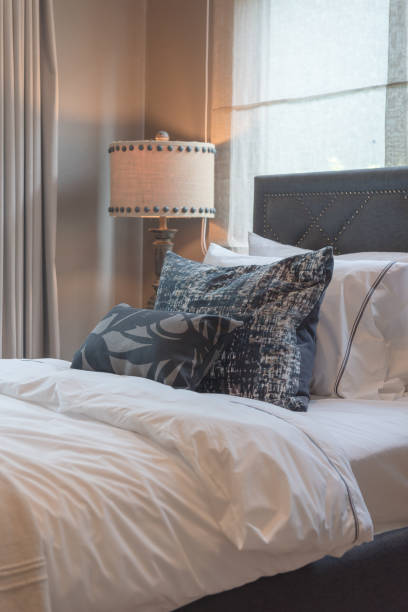 istock single bedroom with set of pillows on bed 874407964
