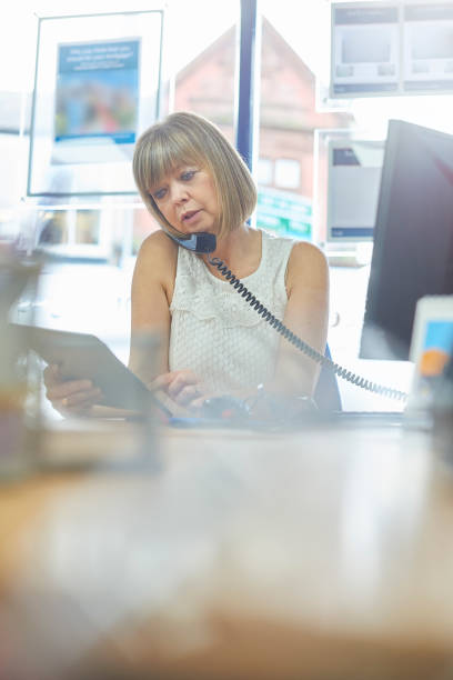 istock Chatting business on the phone 874411106