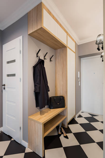 Mudroom with chess floor tiles
