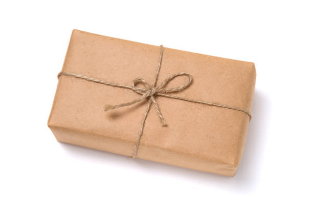 istock Christmas gift box wrapped in kraft paper. 874411468