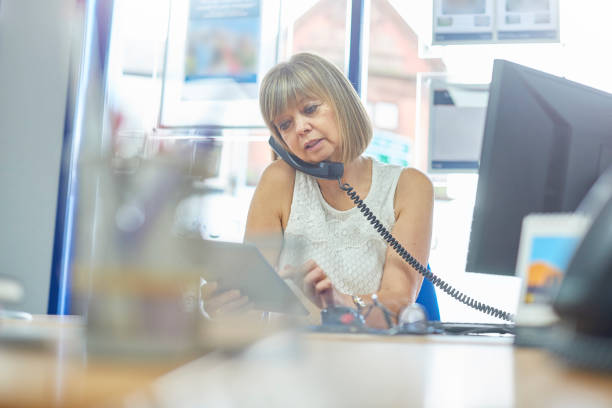istock Talking business on the phone 874411518