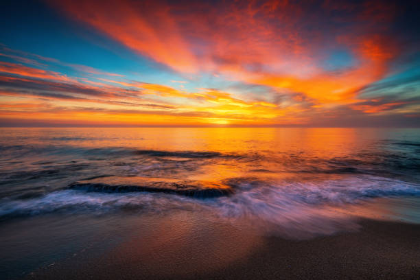 istock Beautiful cloudscape over the sea, sunrise shot 874412912