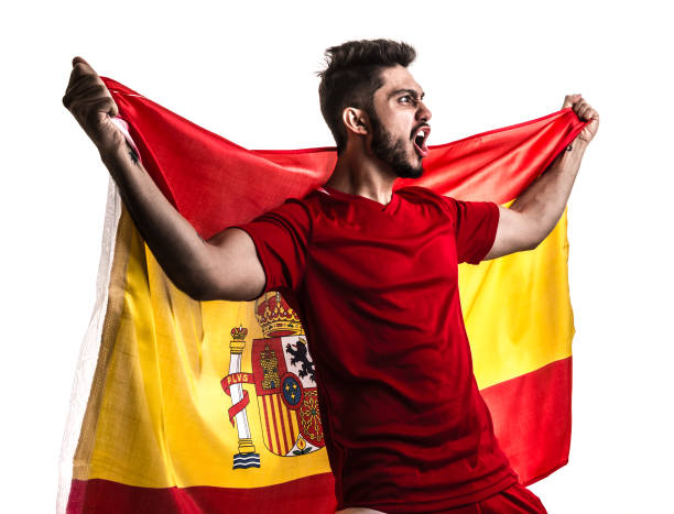 istock Spanish athlete / fan celebrating on white background 874418202