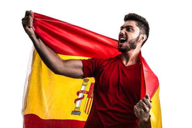 istock Spanish athlete / fan celebrating on white background 874418336