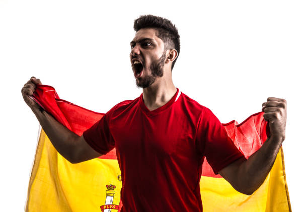 istock Spanish athlete / fan celebrating on white background 874418370