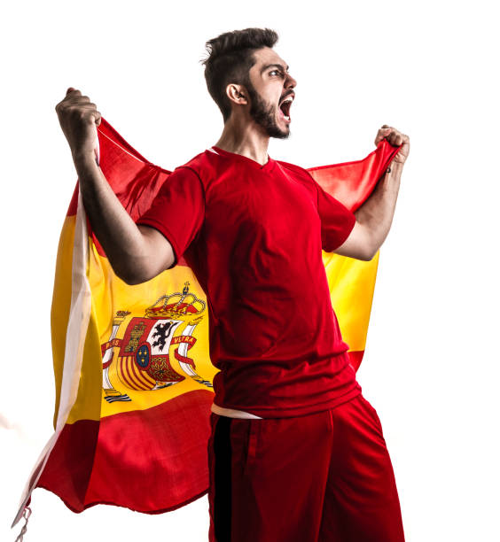 istock Spanish athlete / fan celebrating on white background 874418376