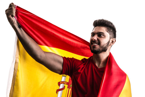 istock Spanish athlete / fan celebrating on white background 874418428