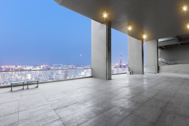 istock empty marble floor with modern cityscape at twilight 874418552