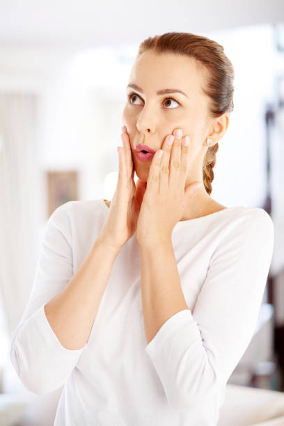 istock Surprised young woman 874419852