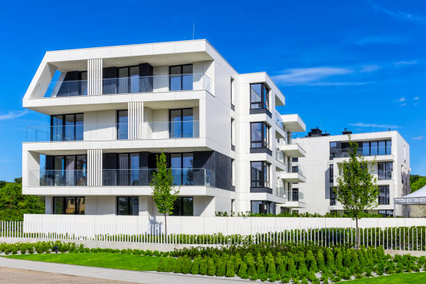istock Modern white apartment buildings 874426602