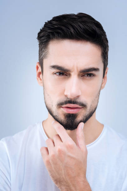 istock Young qualified specialist thinking about his new project 874431004