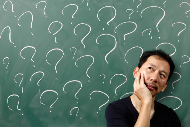 istock Doubtful man asking questions to himself 874431288