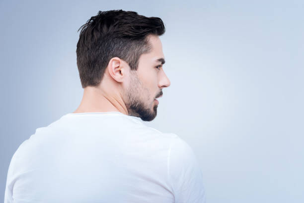 istock Stubborn serious man rejecting to communicate with other people 874431466