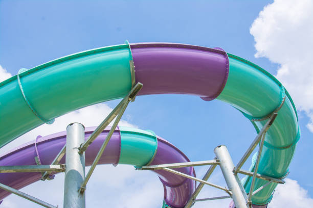 istock water slide with blue sky in water park 874431822