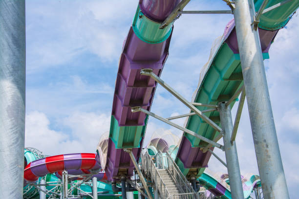 istock water slide with blue sky in water park 874432080