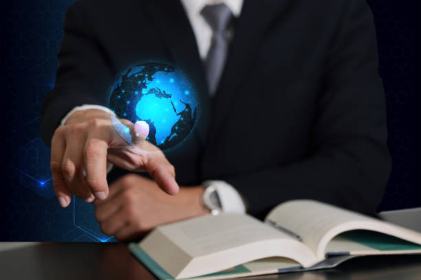 istock Businessman hand touching future sign and light blue circular world map line networking on hexzgonal background as business, globalization, communication and innovation concept 874449856