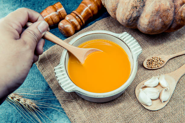 istock pumpkin soup for Halloween and Thanksgiving party 874453944