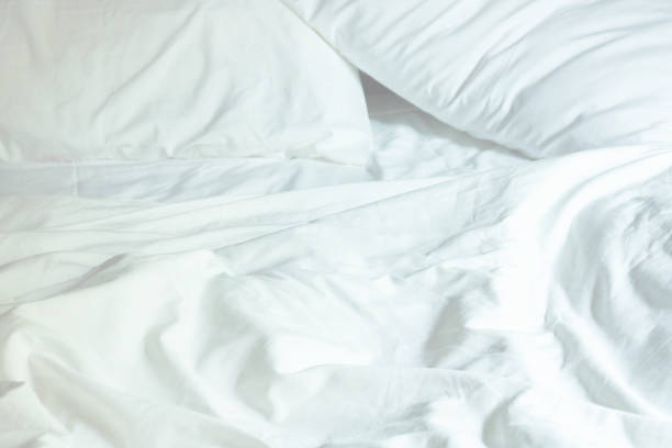 istock White Pillow On Bed And With Wrinkle Messy Blanket In Bedroom, From Sleeping In A Long Night Winter. 874457296