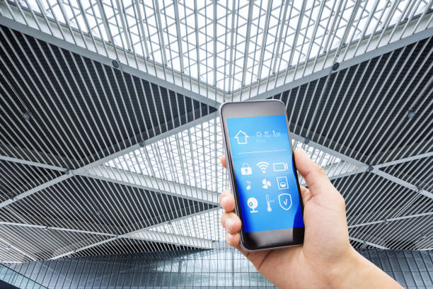 istock smart phone with smart home with modern hall 874461464