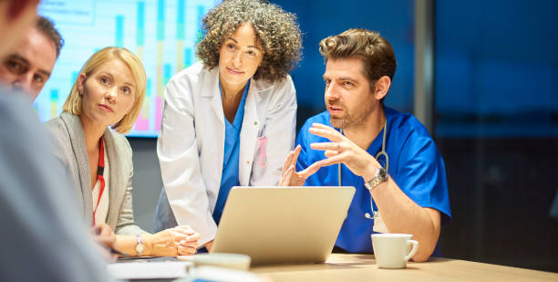 istock doctor in team briefing 874463898