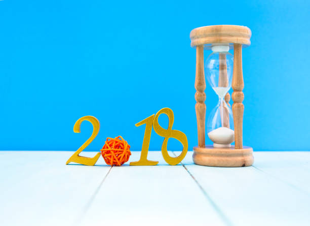 istock number 2018 and an hourglass 874464918