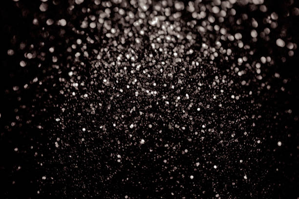 istock Black glitter sparkle background. Black friday shiny pattern with sequins. Christmas glamour luxury pattern, black christmas and glitter diamond background. Dark silver pattern. 874471396